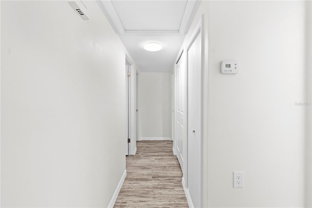 hallway featuring light hardwood / wood-style floors