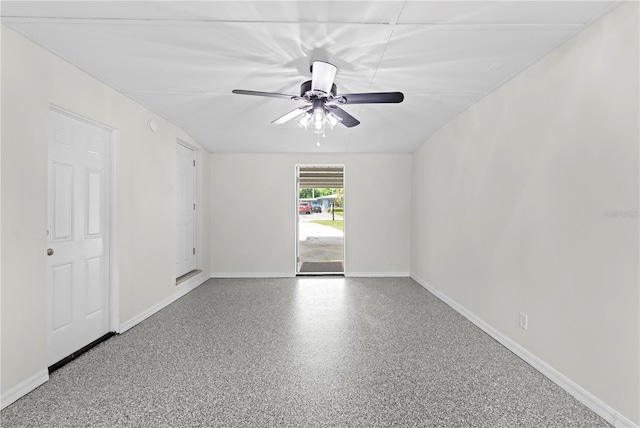 empty room featuring baseboards and a ceiling fan