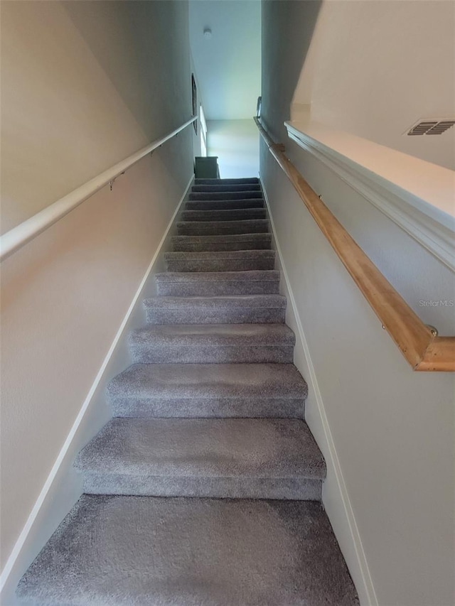 14443 Touch Gold Ln, Sun City Center, FL 33573 - staircase featuring visible vents