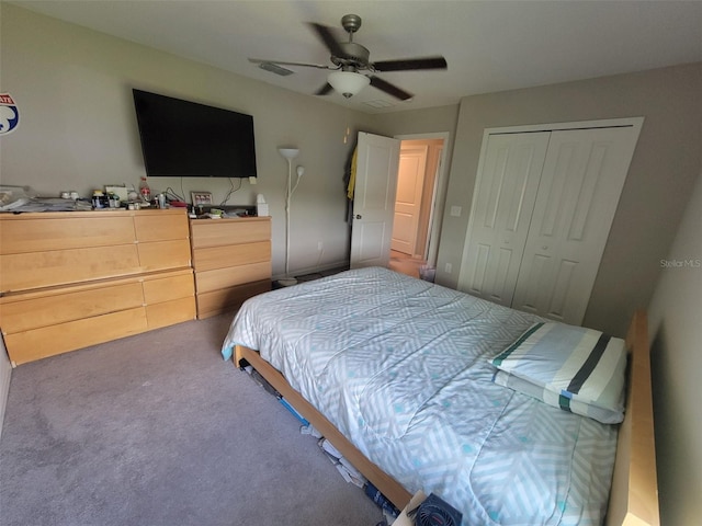 bedroom with a closet, ceiling fan, and carpet floors