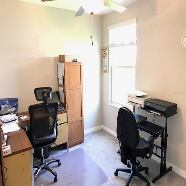14443 Touch Gold Ln, Sun City Center, FL 33573 - carpeted home office featuring baseboards and a ceiling fan