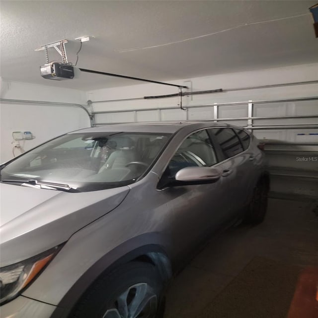 14443 Touch Gold Ln, Sun City Center, FL 33573 - garage with a garage door opener