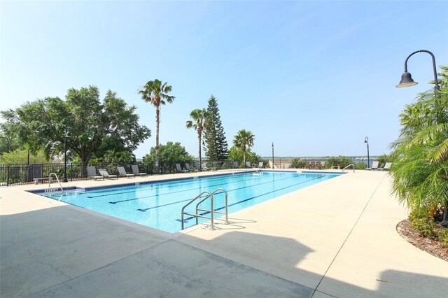 view of pool featuring a patio