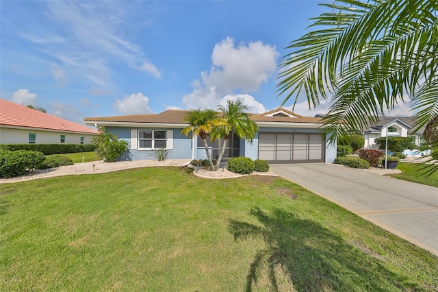 single story home with a front yard and a garage