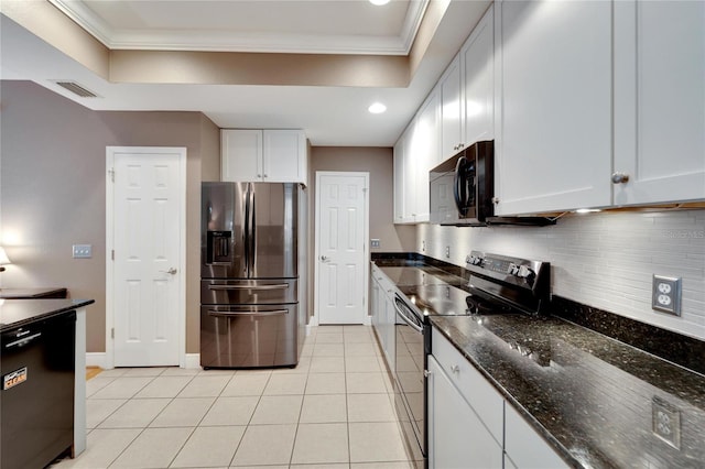 kitchen featuring visible vents, dark stone counters, decorative backsplash, stainless steel appliances, and light tile patterned flooring