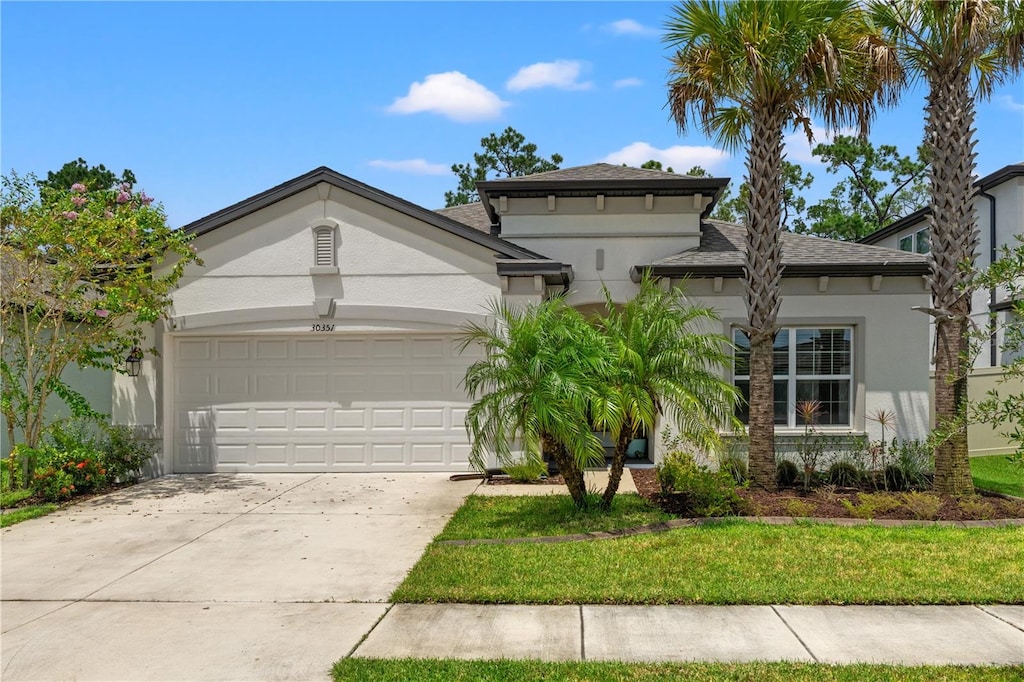 view of front of home with a garage