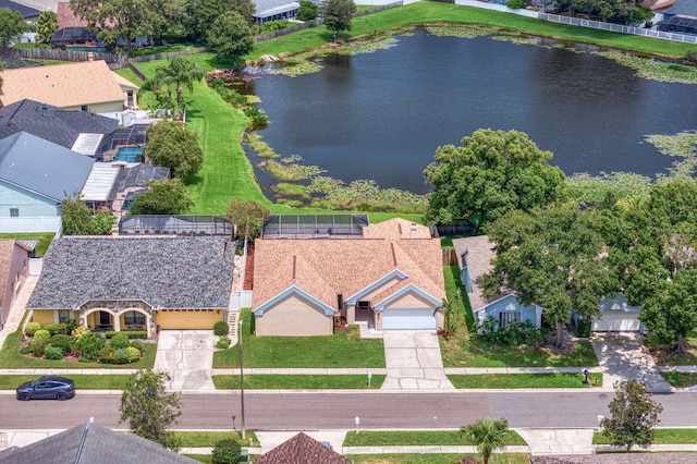 aerial view featuring a water view and a residential view