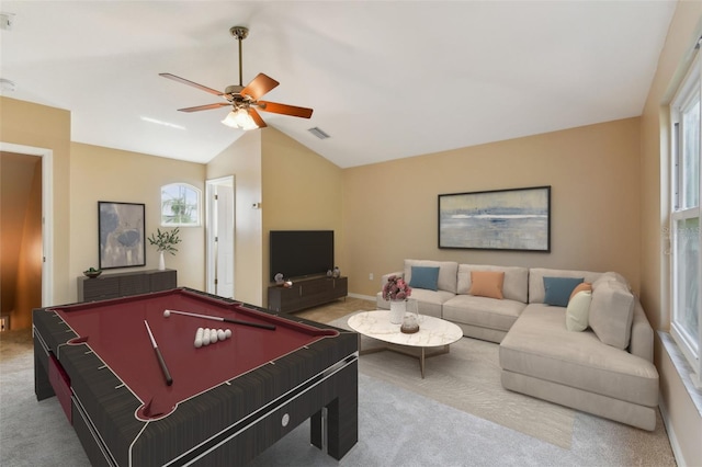 recreation room with visible vents, carpet flooring, vaulted ceiling, ceiling fan, and baseboards