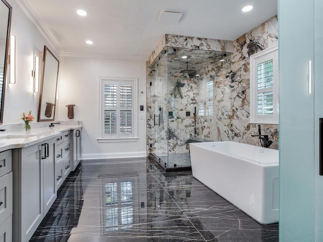 bathroom with a wealth of natural light, vanity, tile patterned flooring, and separate shower and tub