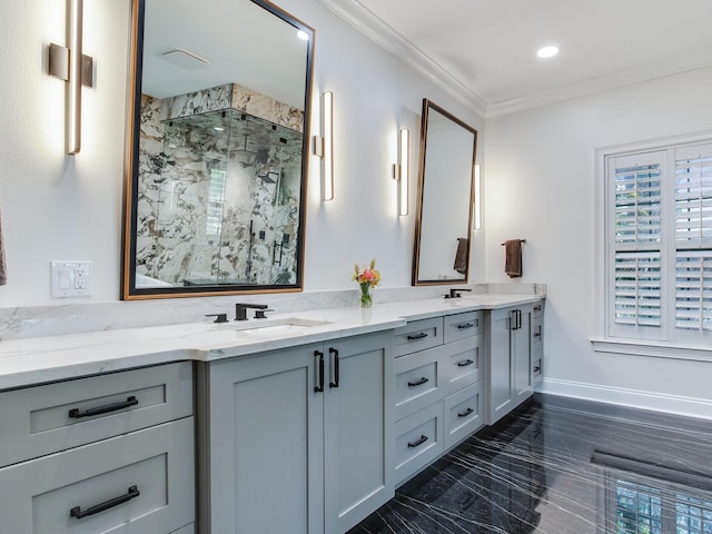 bathroom featuring double sink vanity, tiled shower, tile patterned floors, and crown molding