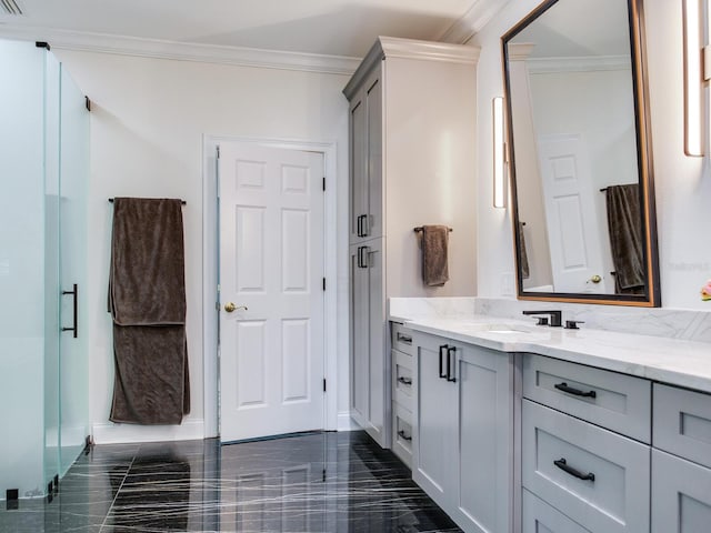 bathroom featuring tile patterned floors, vanity, and crown molding