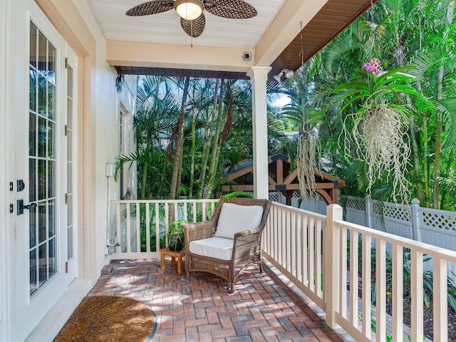 exterior space featuring ceiling fan