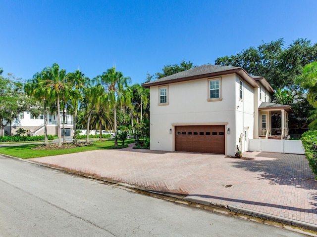 view of side of home with a garage