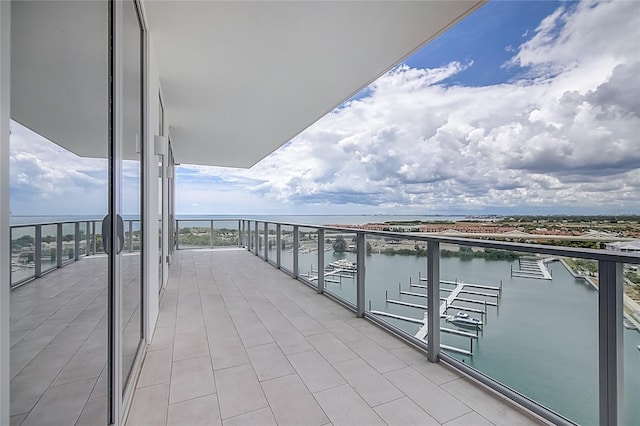 balcony featuring a water view