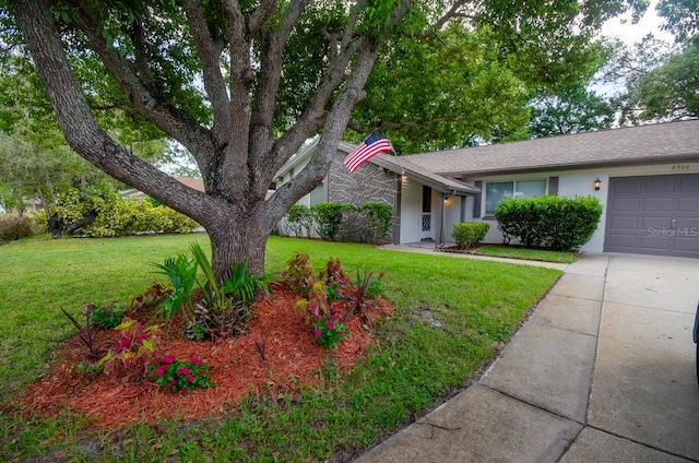 ranch-style house with a front lawn and a garage