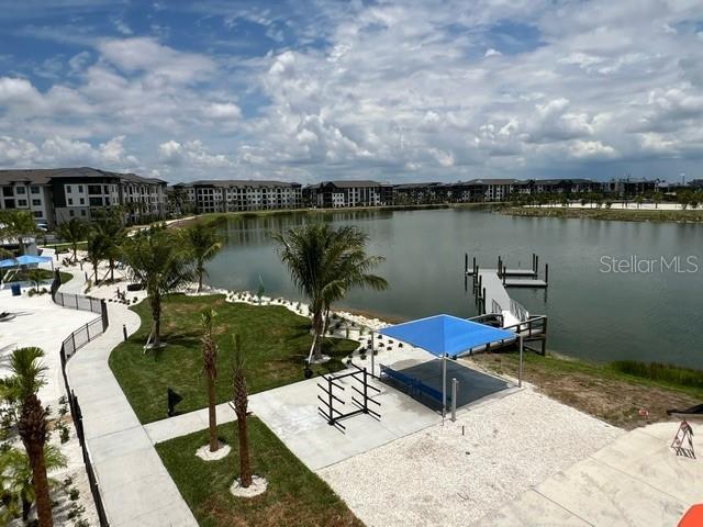 dock area featuring a water view