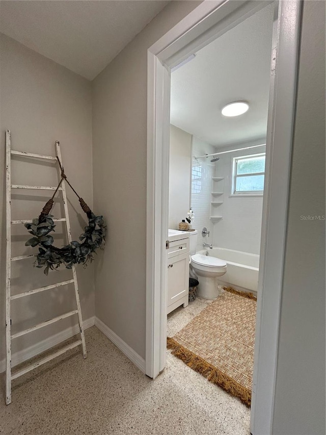 full bathroom with toilet, vanity, and tub / shower combination