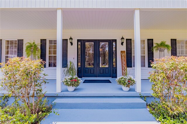 entrance to property with a porch