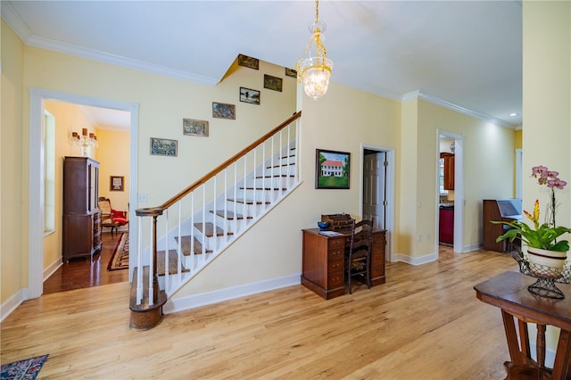 stairs with wood-type flooring and ornamental molding