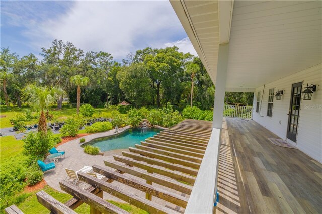 view of swimming pool with a patio area