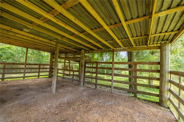 view of stable with an outbuilding