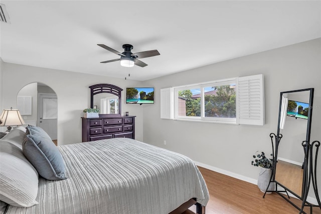 bedroom featuring hardwood / wood-style flooring and ceiling fan