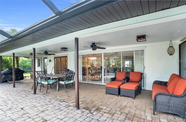 view of patio / terrace with grilling area and ceiling fan