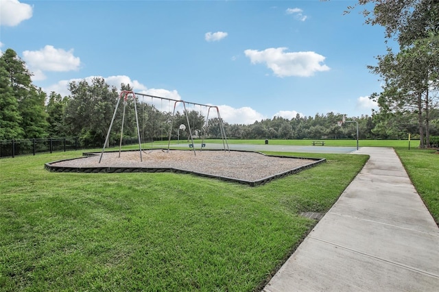 view of play area featuring a lawn