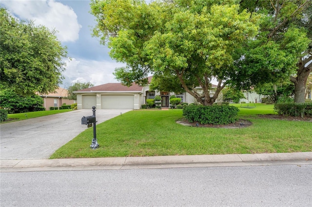 view of front facade with a front lawn, stucco siding, a garage, and concrete driveway