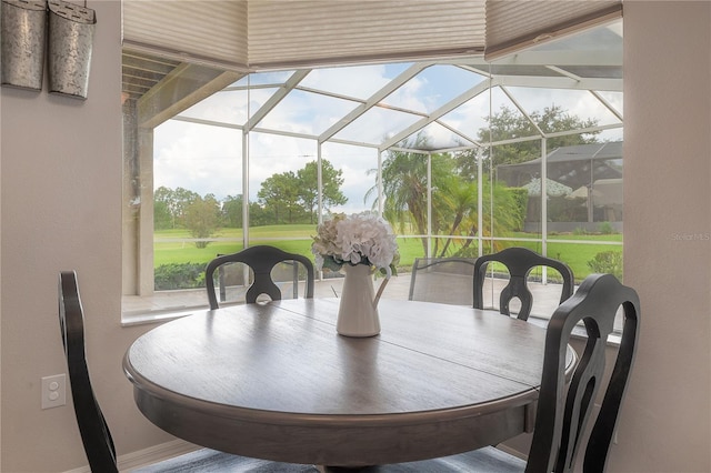 dining area featuring a sunroom