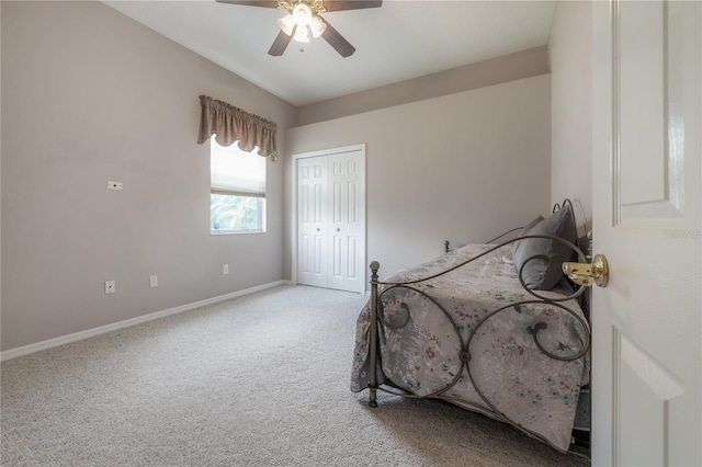 bedroom featuring ceiling fan, a closet, and carpet flooring