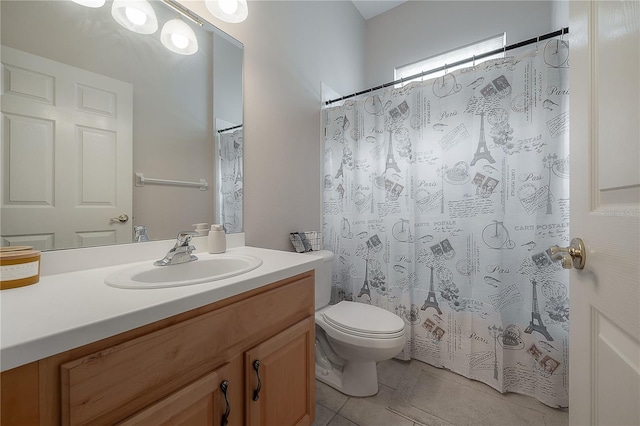 bathroom with tile patterned floors, vanity, walk in shower, and toilet