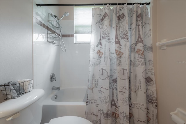 full bath featuring toilet and shower / bathtub combination with curtain