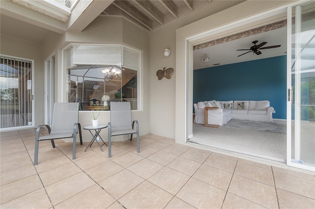 view of patio / terrace featuring ceiling fan