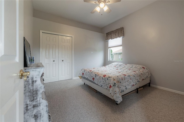 bedroom featuring a ceiling fan, a closet, carpet, and baseboards