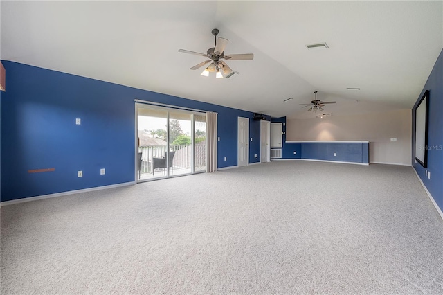 unfurnished living room featuring lofted ceiling, baseboards, visible vents, ceiling fan, and carpet