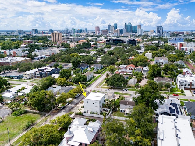 birds eye view of property featuring a city view