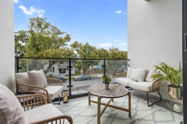 balcony with an outdoor hangout area