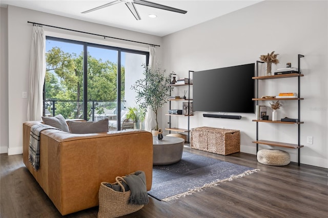 living area with baseboards, dark wood finished floors, a ceiling fan, and recessed lighting