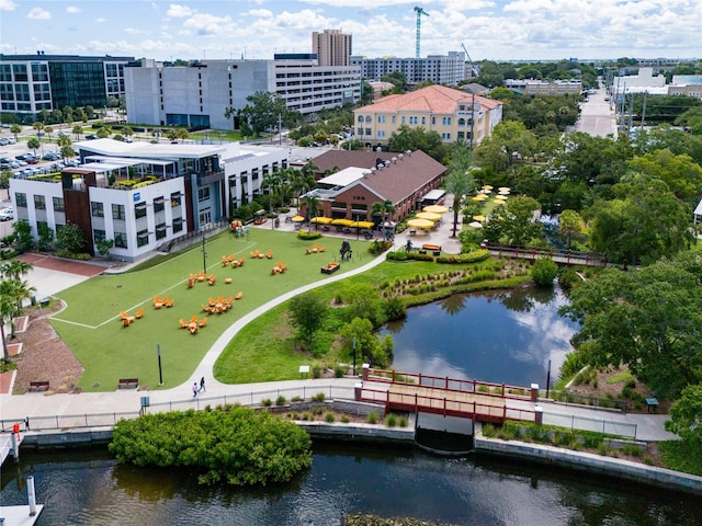 birds eye view of property with a water view