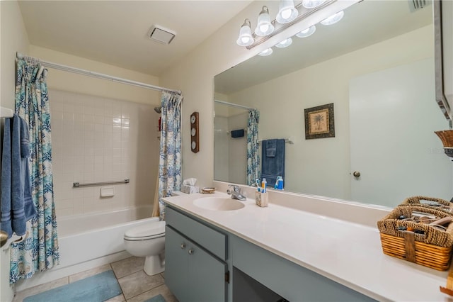 full bathroom with vanity, toilet, tile patterned floors, and shower / bath combo with shower curtain