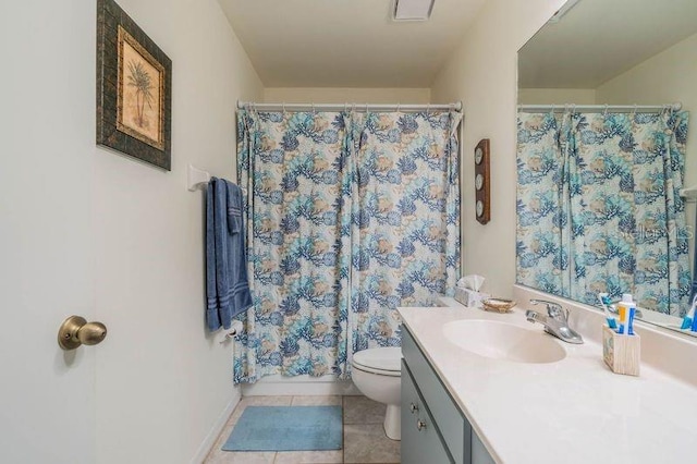 bathroom featuring vanity, toilet, curtained shower, and tile patterned flooring