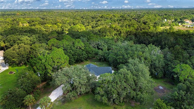 bird's eye view with a forest view