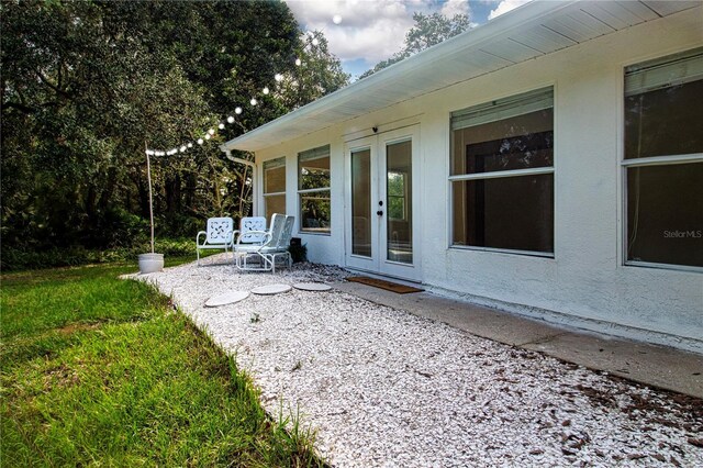 exterior space with a patio and french doors