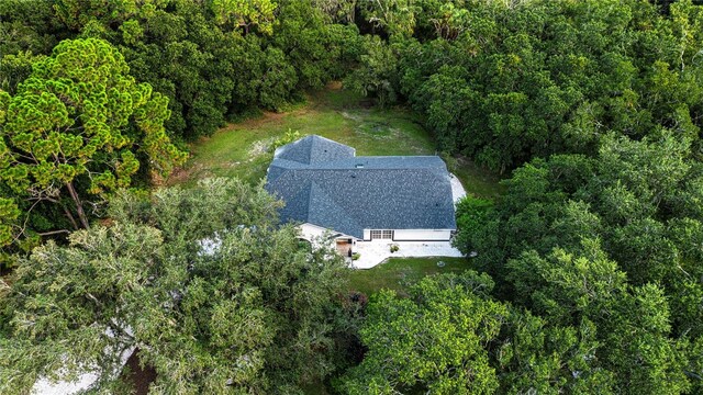 bird's eye view featuring a view of trees