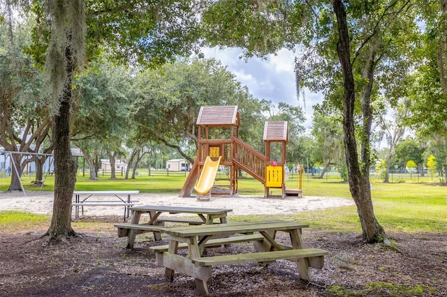 view of jungle gym featuring a yard