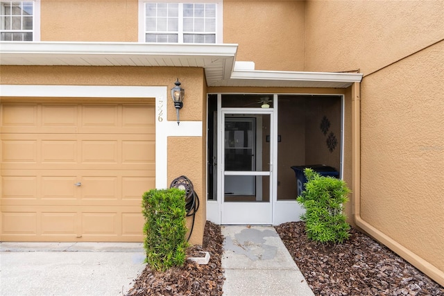 property entrance featuring a garage