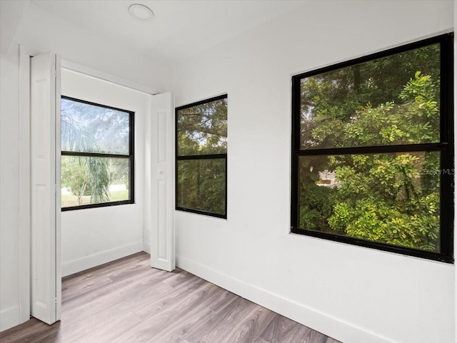 empty room featuring light hardwood / wood-style floors