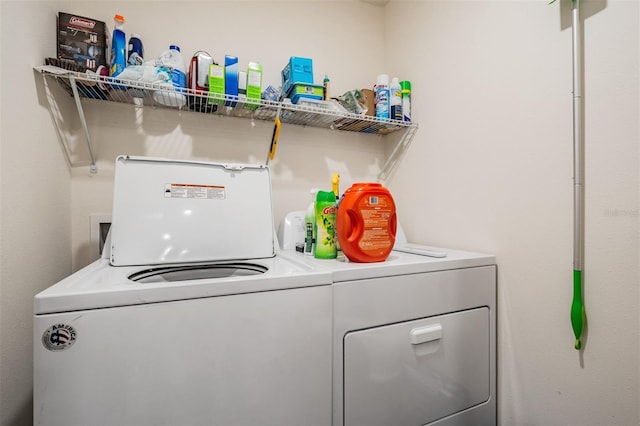 laundry room featuring separate washer and dryer