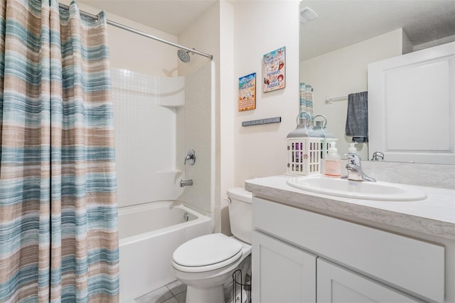 full bathroom featuring tile patterned flooring, vanity, shower / bathtub combination with curtain, and toilet